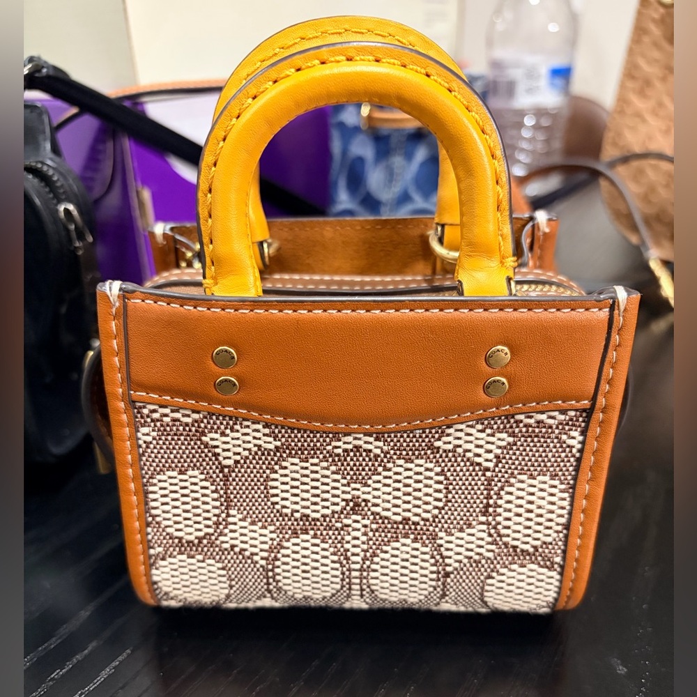 Rogue 12 (mini size) in signature jacquard/canvas with leather trim.